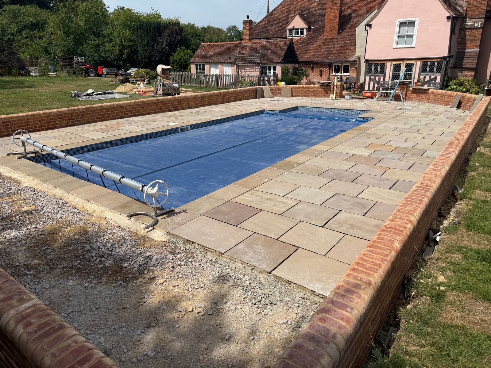 Pool terrace and brick surround nearing completion